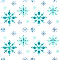 Seamless pattern of delicate graceful snowflakes on a white background. Snowflakes of different shapes and sizes, different shades Royalty Free Stock Photo