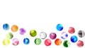 Glas balls in several colours on white background