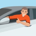 Happy driver sits at the wheel of a gray-white silver car shows `cool` Royalty Free Stock Photo