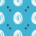 Seamless pattern with hand drawn eggs and chicken footprint isolated on blue background. Royalty Free Stock Photo