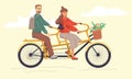 A man and a woman ride a double bike.