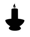 Candle in a candlestick black silhouette - pictogram or logo. Wax burning candle - vector silhouette picture for a sign or corpora Royalty Free Stock Photo