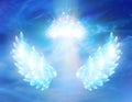 Spiritual guidance, divine energy, Angel of light and love doing a miracle on sky, blue angelic wings Royalty Free Stock Photo