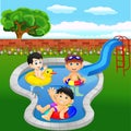 Happy kids playing in an outdoor swimming pool