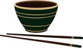 Green bowl with gold rim with chopsticks