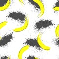 Bananas and gray spots on white background. Royalty Free Stock Photo