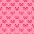 Beautiful seamless pattern made of pink ribbon bows and white dots on pink background.