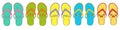 Collection of rubber multi-colored flip flops with a marine pattern Royalty Free Stock Photo