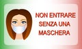 `Non entrare senza una maschera` poster. Translation: `Do not entry without mask`. Royalty Free Stock Photo