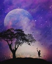Spiritual release, inner child,dreams,hope, wishes, child catching a bird, faith, destiny, full moon, night sky, nature background Royalty Free Stock Photo