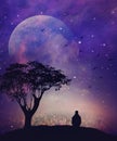 Man silhouette above city, thinking, meditation under stars, full moon on night sky Royalty Free Stock Photo