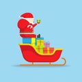 Santa claus sitting on a sleigh.