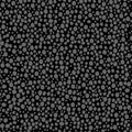 abstract simple seamless pattern many small dots spots on a contrasting background. Leopard background grey and black Royalty Free Stock Photo