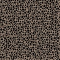 abstract simple seamless pattern many small dots spots on a contrasting background. Leopard background beige Royalty Free Stock Photo
