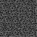 abstract simple seamless pattern many small dots spots on a contrasting background. Leopard background black dot grey Royalty Free Stock Photo