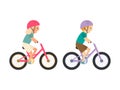 Cute happy children riding bicycles. Girl and boy with helmets ride bikes. Royalty Free Stock Photo