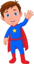 Cute boy wearing superhero costume and waving