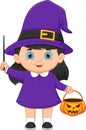 Little girl wearing witch costume  holding wand and bucket Royalty Free Stock Photo