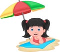 Little girl sunbathing on the beach Royalty Free Stock Photo