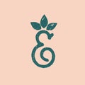 Ampersand logo. Decorative plant, green leaf elements. Royalty Free Stock Photo