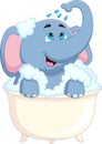 Cartoon baby elephant bathing in the bathtub Royalty Free Stock Photo