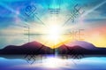 Vegvisir the runic compass of the vikings navigators. Colorful sunset sky, water mirror, nature landscape Royalty Free Stock Photo