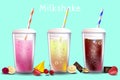 set of appetizing milkshakes surrounded by fresh berries