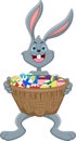Cartoon funny rabbit with lots of eggs in the basket