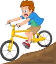 boy riding a bicycle on a downhill road Royalty Free Stock Photo