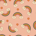 Seamless pattern with rainbow, clouds and daisies in retro 70s style.