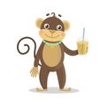 Monkey stands and holds a cold drink in his hand lemonade.