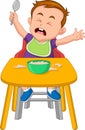 cute baby crying at feeding time cartoon Royalty Free Stock Photo