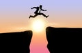 Business jump through the gap between hill, man jumping over cliff, on sunset background,Business concept