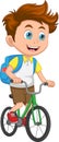 happy schoolboy riding a bicycle