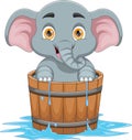 Cheerful baby elephant in wooden bucket cartoon