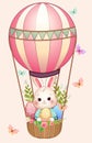 Cute Easter bunny on air balloon. Royalty Free Stock Photo