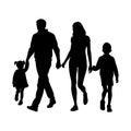 Silhouette of parents walking with one kid Royalty Free Stock Photo