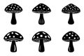 Six Silhouettes of Spotted Mushrooms: Black & White Vector Icons Royalty Free Stock Photo