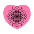 Intricate black floral mandala centered on a soft pink heart background Royalty Free Stock Photo