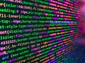 Web abstract programming and created virus on laptop screen. Hi-tech modern screen of data, digits and chars on monitor display. Royalty Free Stock Photo