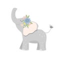 Baby elephant decorated with a wreath of blooming flowers