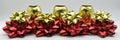 Web Banner Christmas gift wrapping bows. Large glossy red and golden bows Royalty Free Stock Photo