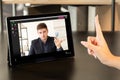 web conference business conflict employee tablet