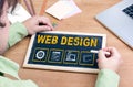 Web Design. Chalkboard on wooden office desk Royalty Free Stock Photo