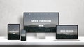 Web design studio promotion page on different display devices