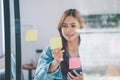 Web designers creating planning and analyzing with Colorful sticky notes on the office board.web design concept Royalty Free Stock Photo