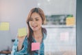 Web designers creating planning and analyzing with Colorful sticky notes on the office board.web design concept Royalty Free Stock Photo