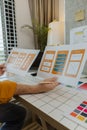 A web developer, as a User Experience and User Interface Officer, is designing beautiful and easy-to-use digital products that