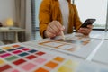 A web developer, as a User Experience and User Interface Officer, is designing beautiful and easy-to-use digital products that