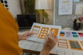 A web developer, as a User Experience and User Interface Officer, is designing beautiful and easy-to-use digital products that